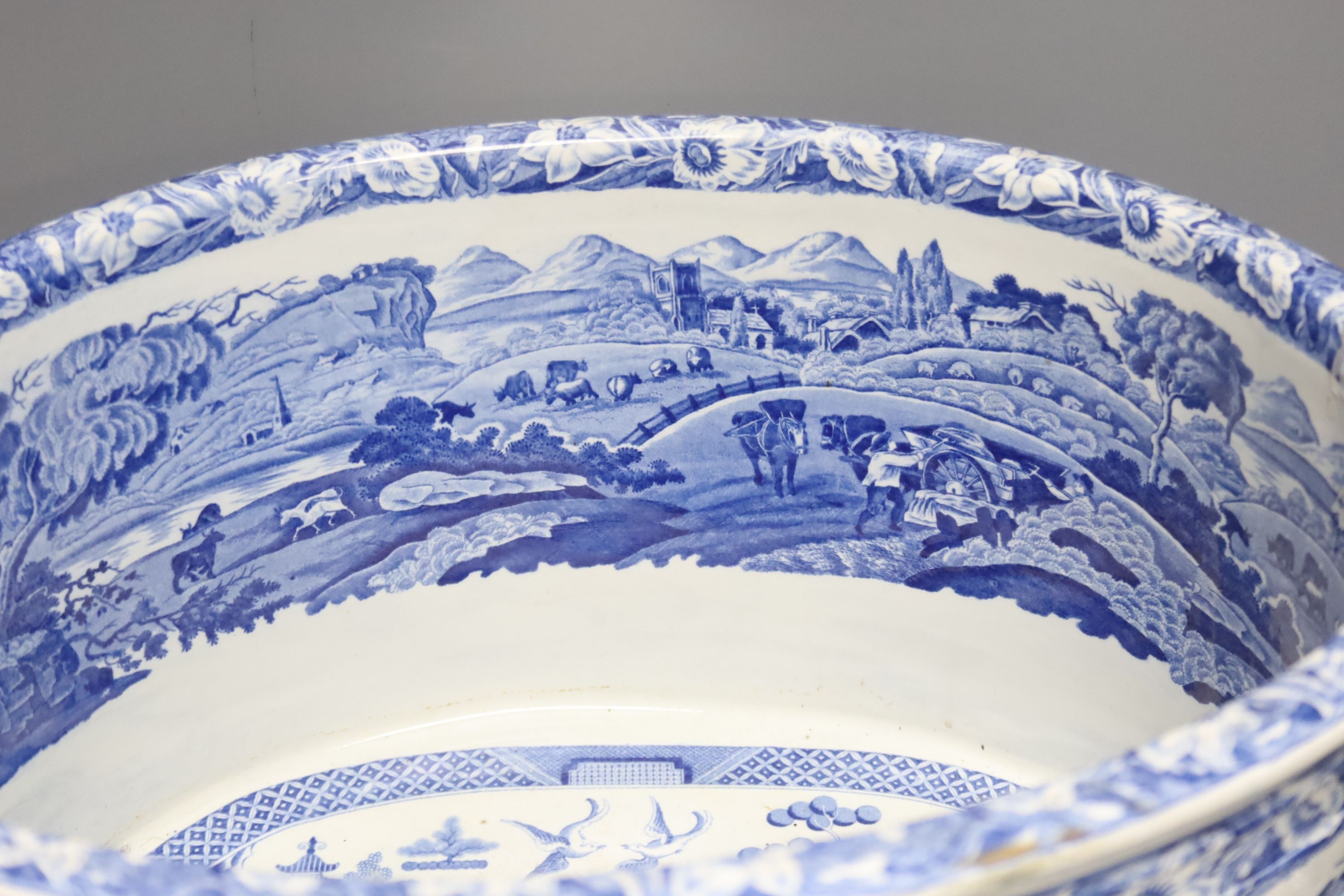 A Victorian Staffordshire blue and white footbath by T. Rathbone & Co., two handled, impressed marked, width 48cm